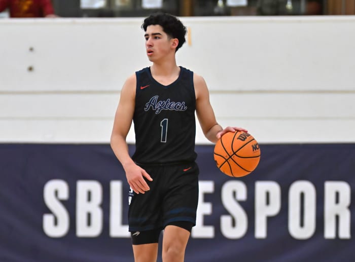 Montgomery junior Xair Mendez dribbles up the court during December's Torrey Pines Holiday Classic